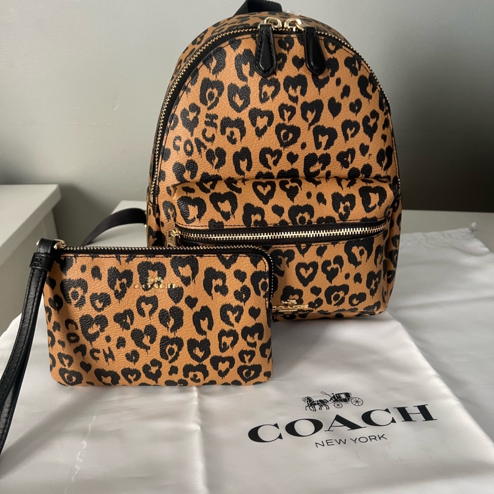 Coach Mini Charlie
Backpack With Wild Heart Print and
Matching Wristlet